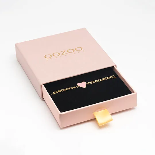 Gold coloured bracelet with pink heart charm