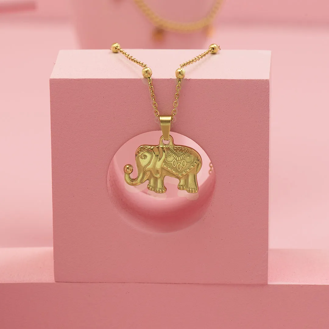 Gold coloured necklace with elephant charm